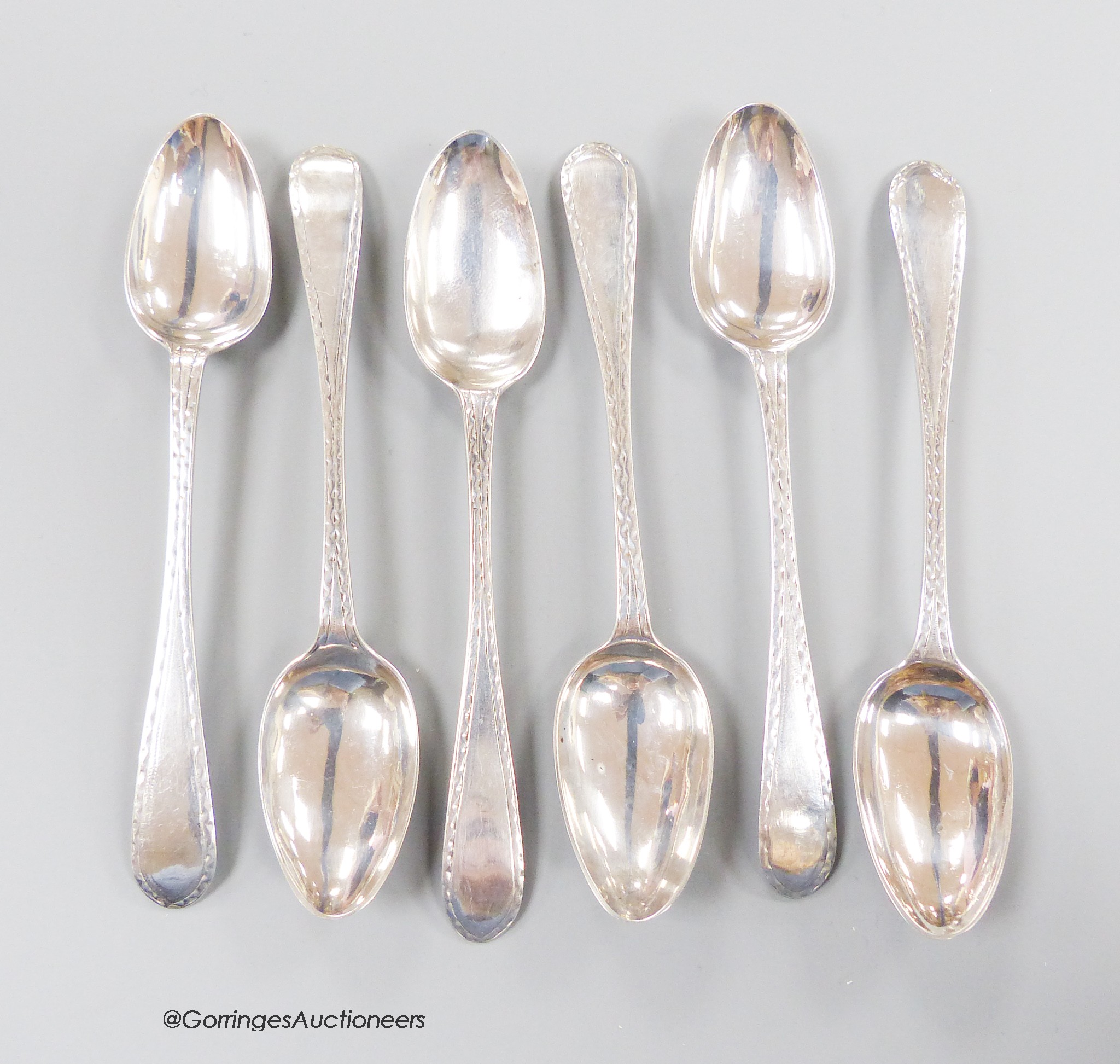 A set of six late 18th century Scottish provincial silver bright cut engraved teaspoons, by Benjamin Lumsden, Montrose, c.1790, 12.5cm, 67 grams.